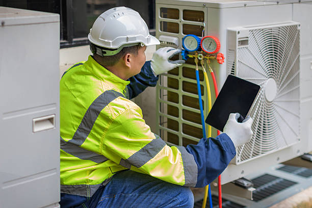 Professional Heat Pump Repair technician working in Sterling, MA